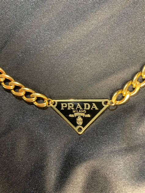 black and gold prada necklace